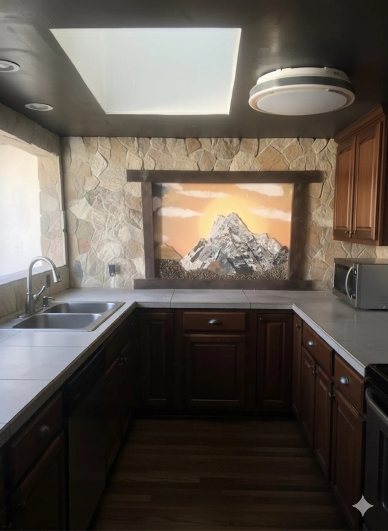 Hand-cut glass mountain landscape kitchen backsplash